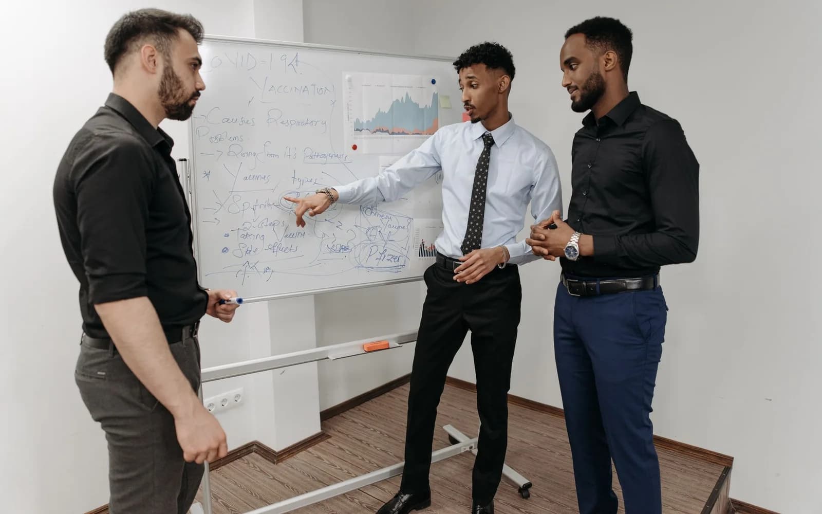 Editorial photograph: Men having a Meeting