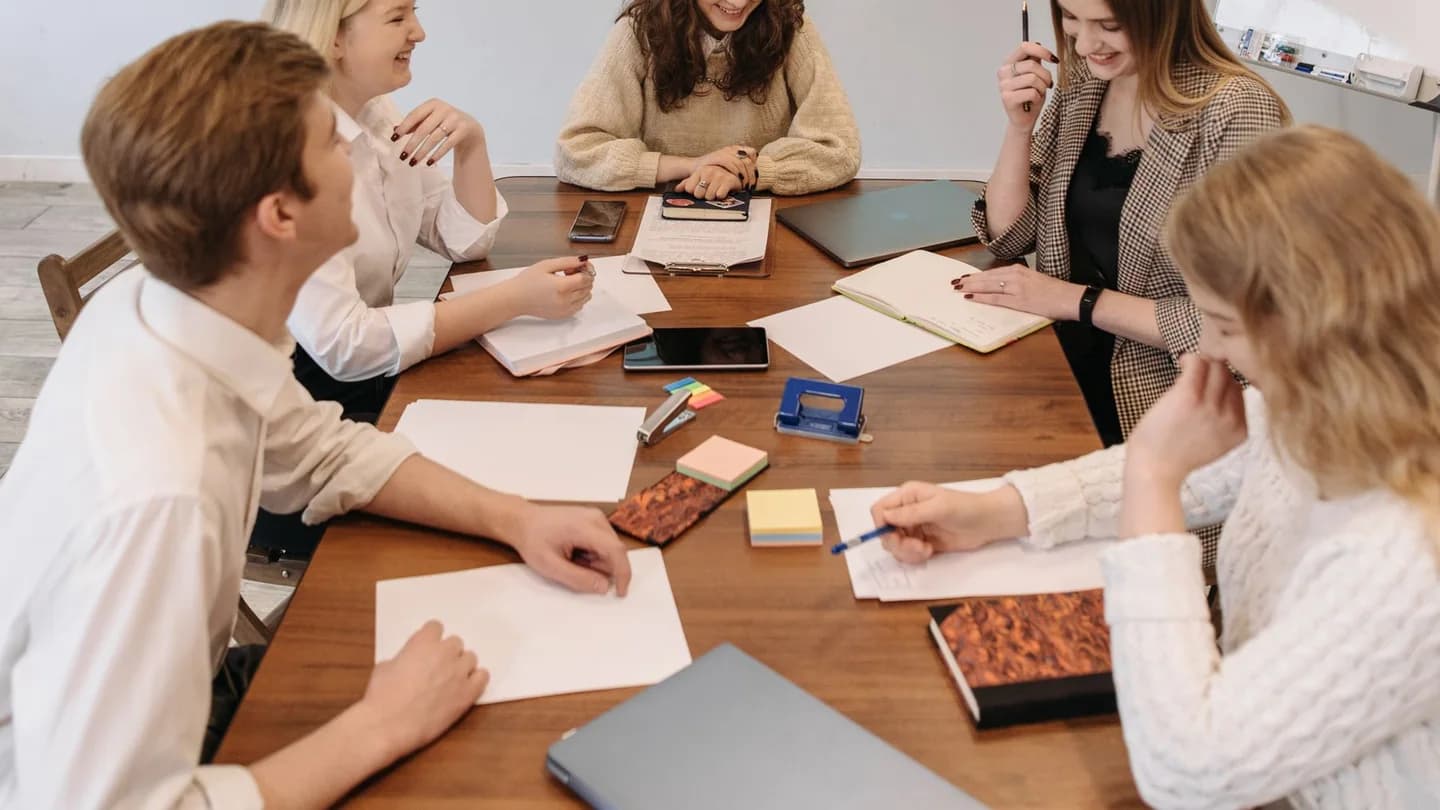 A cross-functional team deciding segment, offer, route and launch proof