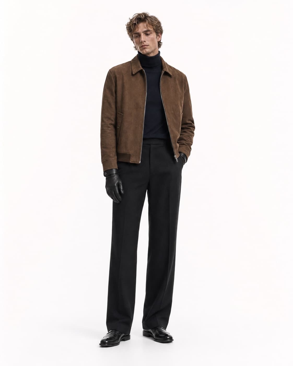 The Tobacco After Dark look on a model: tobacco-brown zip blouson, dark navy roll-neck, black tailored trousers and black gloves, on white