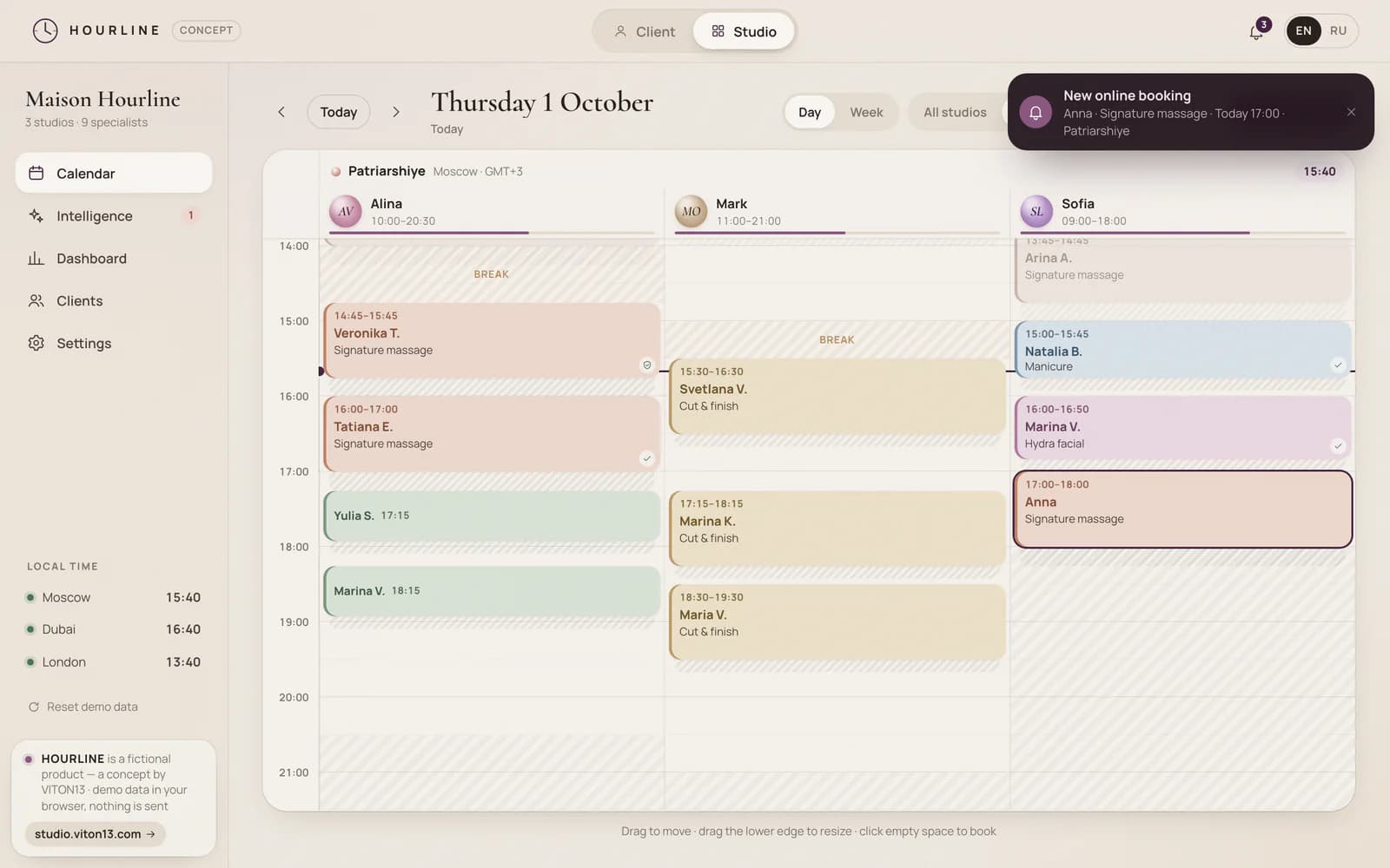 The studio calendar for Thursday 1 October at the Moscow studio: three specialists’ columns with bookings as coloured blocks, a “now” line at 15:40 and a new booking for Anna at 17:00 outlined, with the notification “New online booking” in the top right corner.