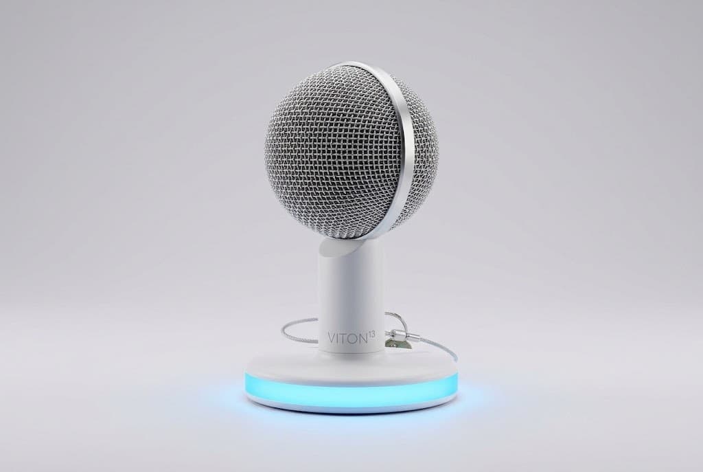 A round silver-mesh VITON13 microphone on a white stand with a sky-blue ring