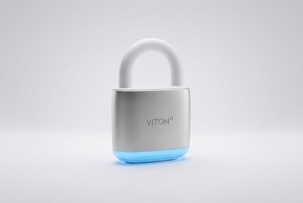 A silver VITON13 padlock with a white shackle and a sky-blue glow at its base